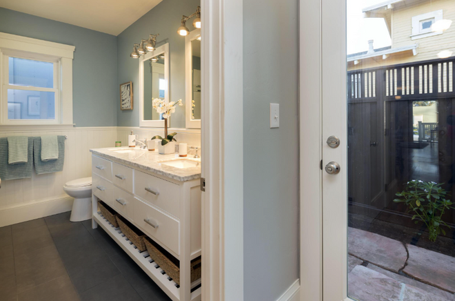 Interior bathroom painting in Marin County by MoonDance Painting — blue-gray walls with white trim